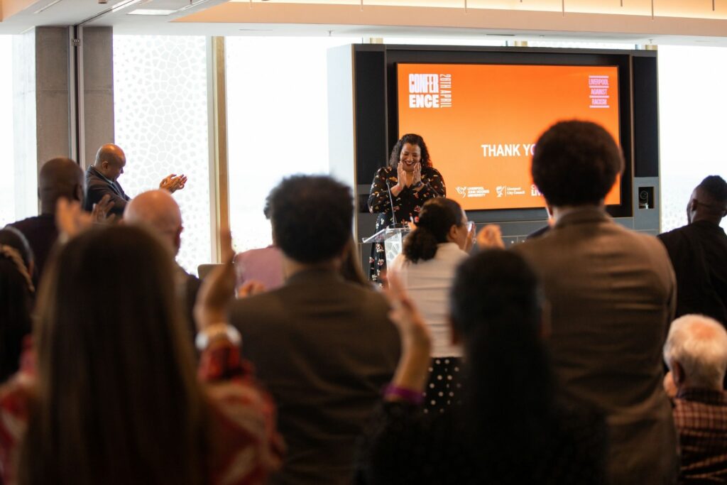 Audience applauding Mayor Joanne Anderson at Liverpool Against Racism conference