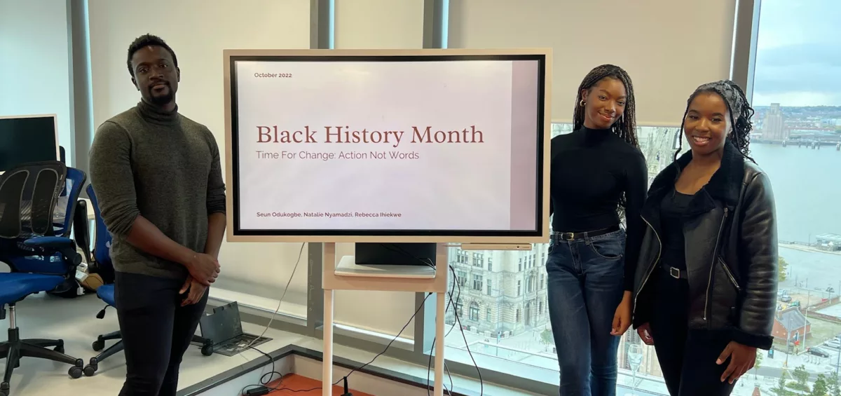 three members of cel solicitors staff giving a presentation titled "Black History Month"